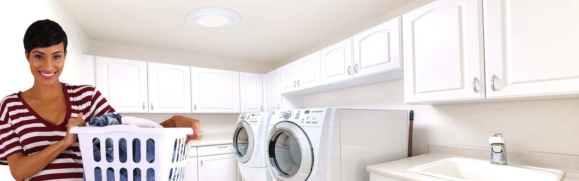 Woman under Natural Light exhaust vent in laundry room